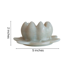 Traditional lotus flower candle holder sculpted in marble.