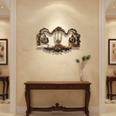 An ornate brass wall hanging displaying the U-shaped Venkateswara Namam (tilak) in the center, flanked by the Shankha (conch) and Chakra (discus) symbols, with decorative border work.