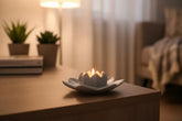 Handcrafted marble lotus flower candle stand with intricate petal carving.
