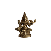 Handcrafted brass saraswati statue for pooja decor.