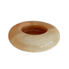 Handcrafted onyx stone ash tray with six-sided design.