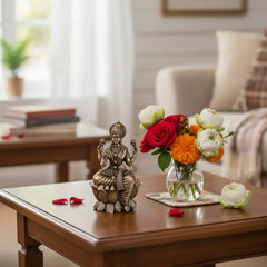 Classic Four-Armed Brass Lakshmi Idol Seated on Lotus - Symbol of Prosperity Brass Ware