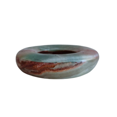 Elegant natural stone ashtray with geometric design.
