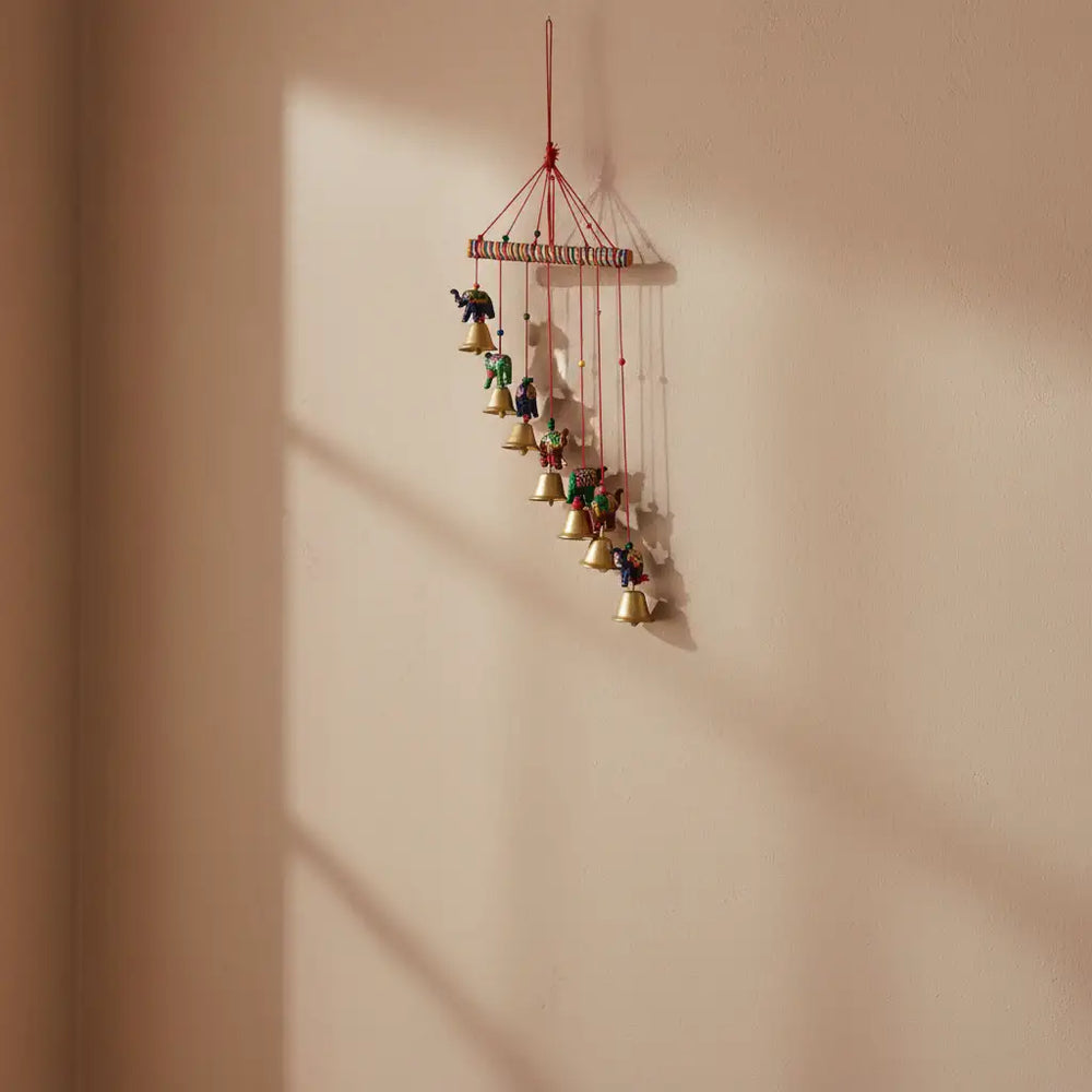 Hand-painted elephant and golden bell wind chime wall hanging with colorful folk art design for home décor