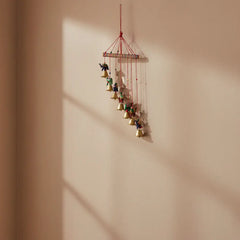Hand-painted elephant and golden bell wind chime wall hanging with colorful folk art design for home décor