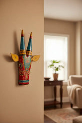 Decorative item with colorful patterns on a textured beige background