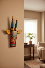 Decorative item with colorful patterns on a textured beige background