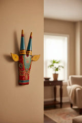 Decorative item with colorful patterns on a textured beige background