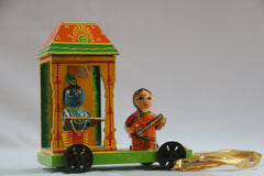 Krishna’s Guidance – Wooden Chariot Artwork with Arjuna