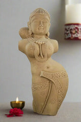 Sand Stone statue of a woman with intricate designs on a neutral background