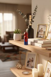 Toy figure with blue and red design on a white background