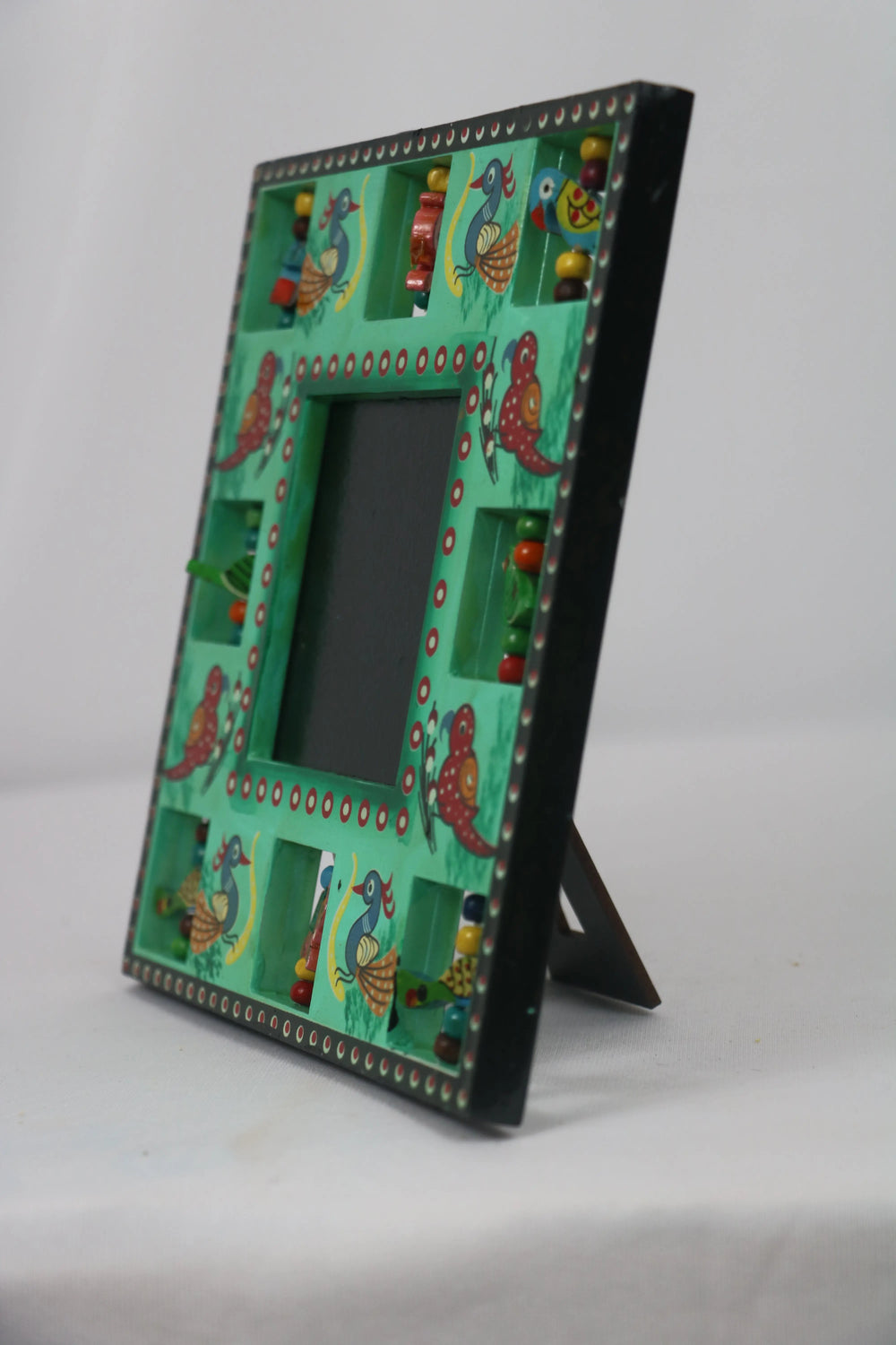 Handcrafted Wooden Parrot Photo Frame – Colorful Decorative Wall Accent Balaji varanasi