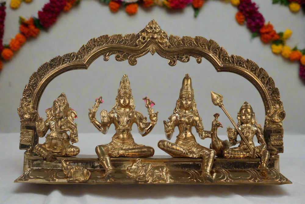 Gold-colored religious statue set with an arch on a gray background
