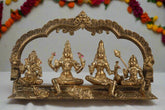 Gold-colored religious statue set with an arch on a gray background