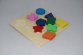 Colorful wooden shape puzzle on a light gray background