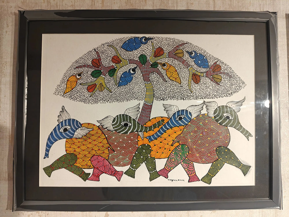 Framed artwork with colorful abstract design of animals and a tree