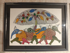 Framed artwork with colorful abstract design of animals and a tree