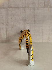 Artisan-made Nirmal wooden tiger with detailed hand-painted folk art design