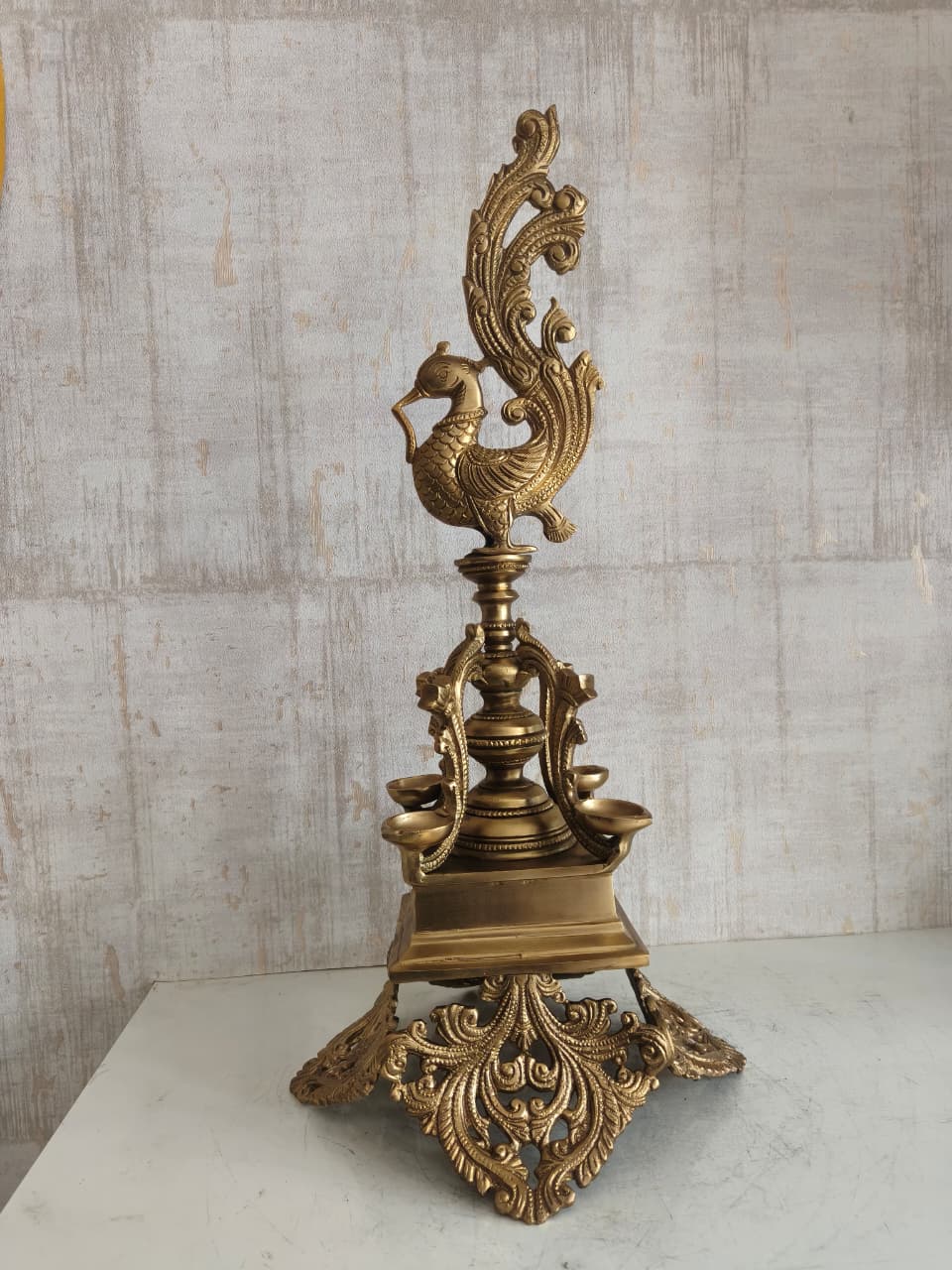 Brass Peacock Pedestal Diya – 4 Wick Traditional Standing Oil Lamp Brass Artwork
