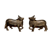Pair of antique brass vastu cow statues, perfect for home decor.