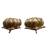 Brass lotus altar set with two sacred flower pieces for home decor.