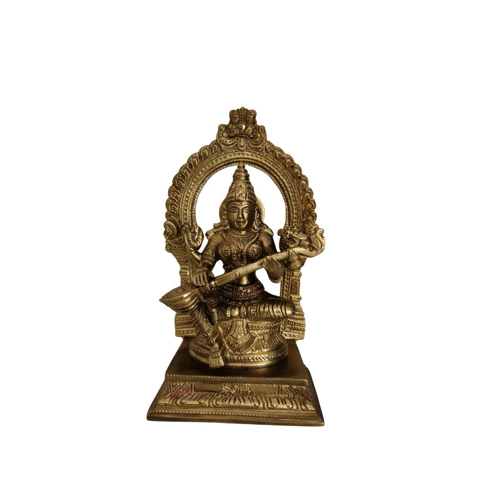 Detailed brass Saraswati idol, Goddess of Knowledge and Arts, intricately crafted.