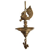 Handcrafted hanging brass oil lamp with an ornate peacock finial and a long chain for suspension.