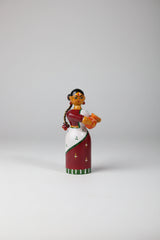 Handmade Etikoppaka wooden doll for home decor and gifts.