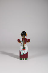 Handcrafted Etikoppaka wooden doll, perfect for home decor and gifts.
