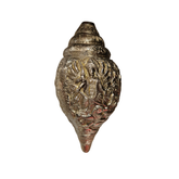 Intricately carved brass shankha with Durga, a traditional pooja item.