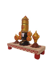Lord Venkateswara wooden altar with golden crown, conch, and chakra wheels on a decorated base