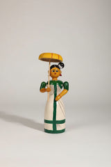 Traditional Etikoppaka wooden doll holding an umbrella, perfect for home decor.