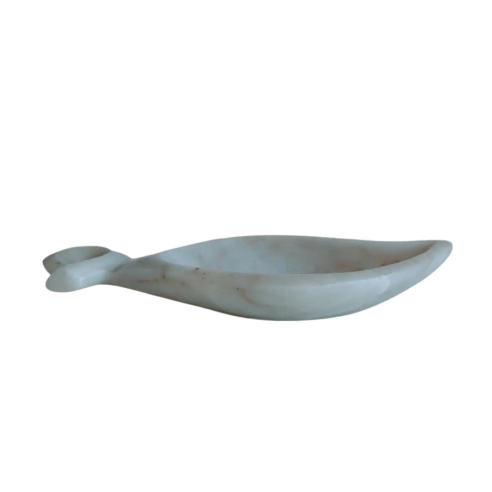 Elegant marble urli centerpiece for living room styling.