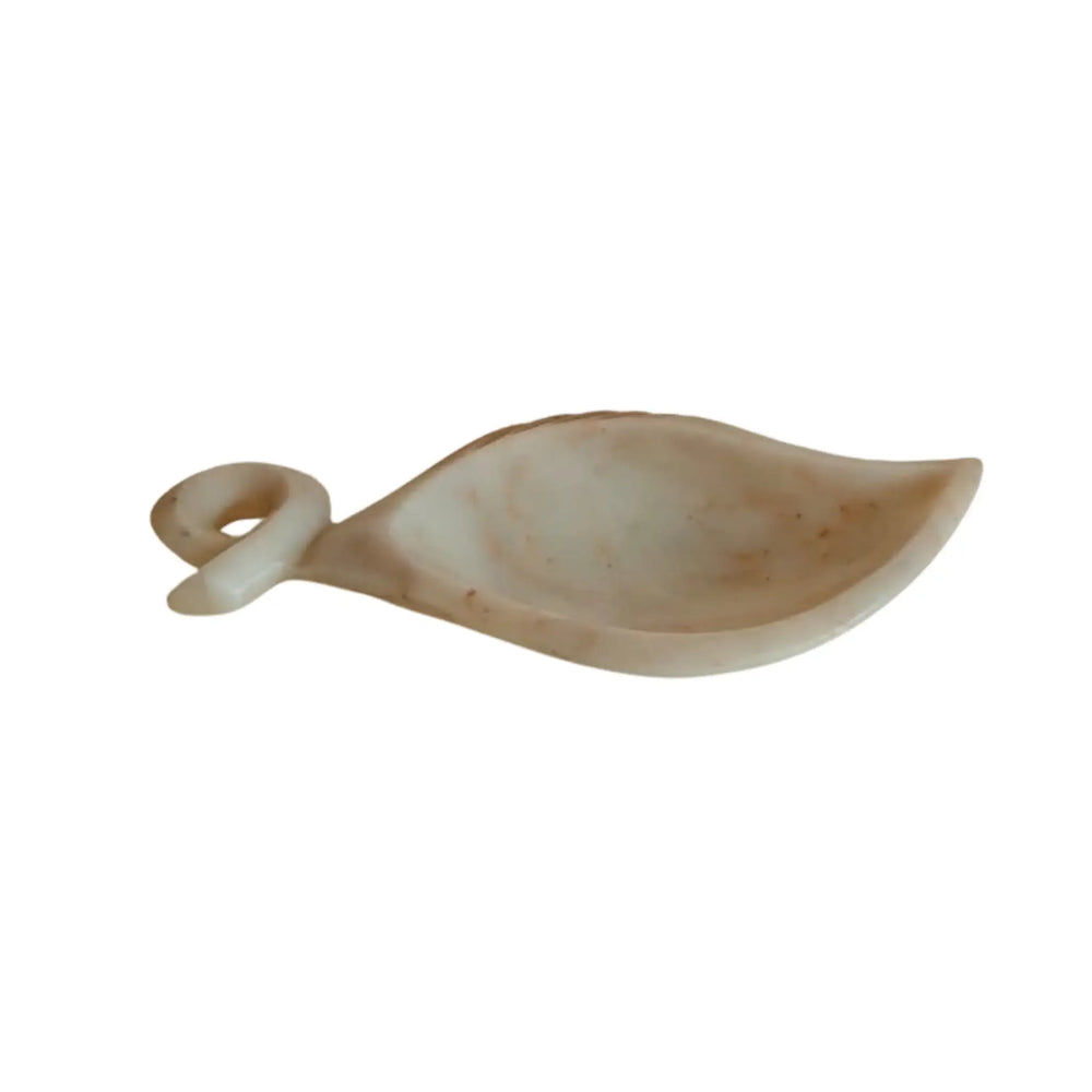 Handcrafted natural marble bowl for festive décor display.