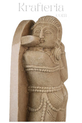 Ancient Stone Carving - A Figure Adorned Sculpture