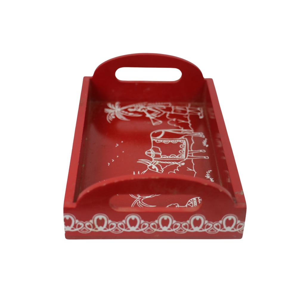Decorative red wooden tray featuring traditional cow painting