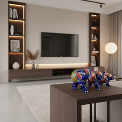 Set of 3 hand-painted wooden elephant family figurines in royal blue with intricate Indian folk art detailing