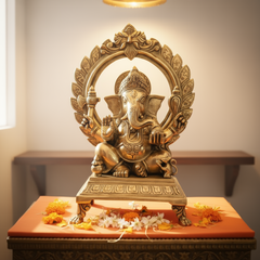 Brass Lord Ganesha Idol on Pedestal with Ornate Prabhavali Arch