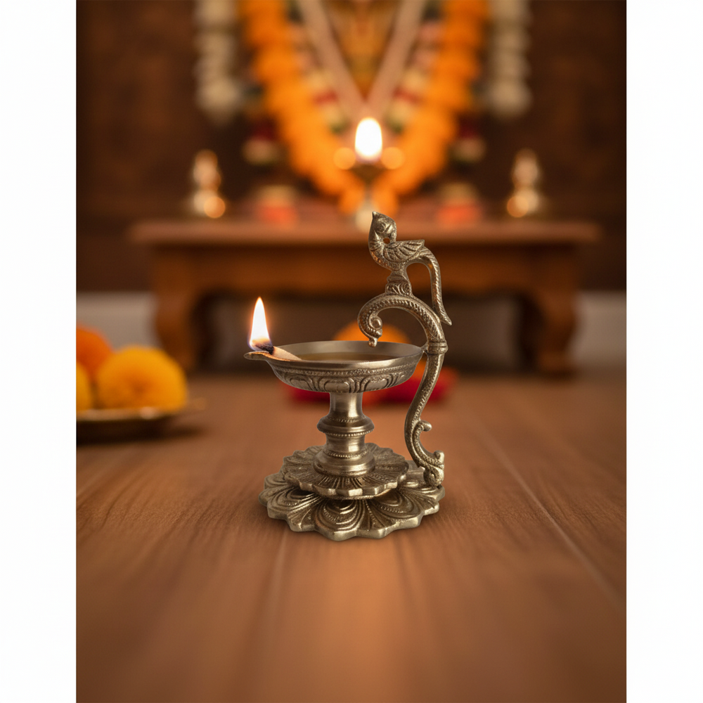 Handcrafted Brass Peacock Pedestal Diya – Traditional Tabletop Oil Lamp with Lotus Base   Brass Artwork
