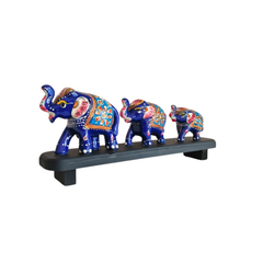 Hand-Painted Blue Elephant Family Figurines on Display