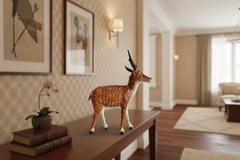 Handcrafted Nirmal lacquered deer toy with traditional folk art finish