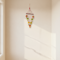 Vibrant hand-painted clay and metal bell wind chime wall hanging with colorful traditional Indian folk art design