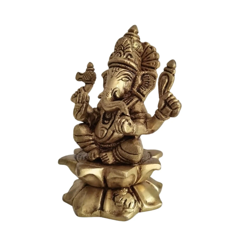 Brass Ganesha Sculpture: Symbol of Prosperity, Intellect, and Protection   Brass Ware