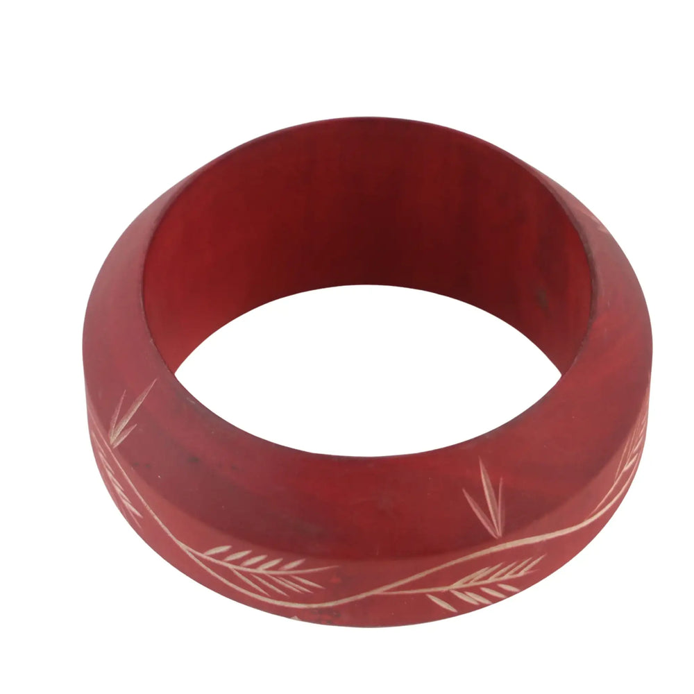 Artisan-made wooden bangles with smooth natural texture