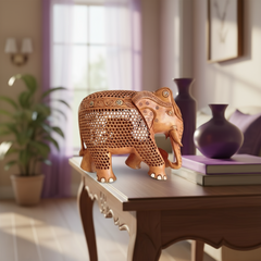 Masterpiece hand-carved wooden elephant sculpture with intricate jali filigree design and inner elephant carving