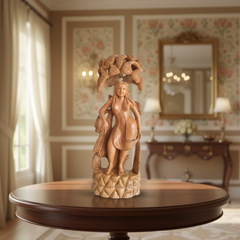 Hand-carved wooden Salabhanjika celestial maiden sculpture standing under a fruiting tree with intricate detailing