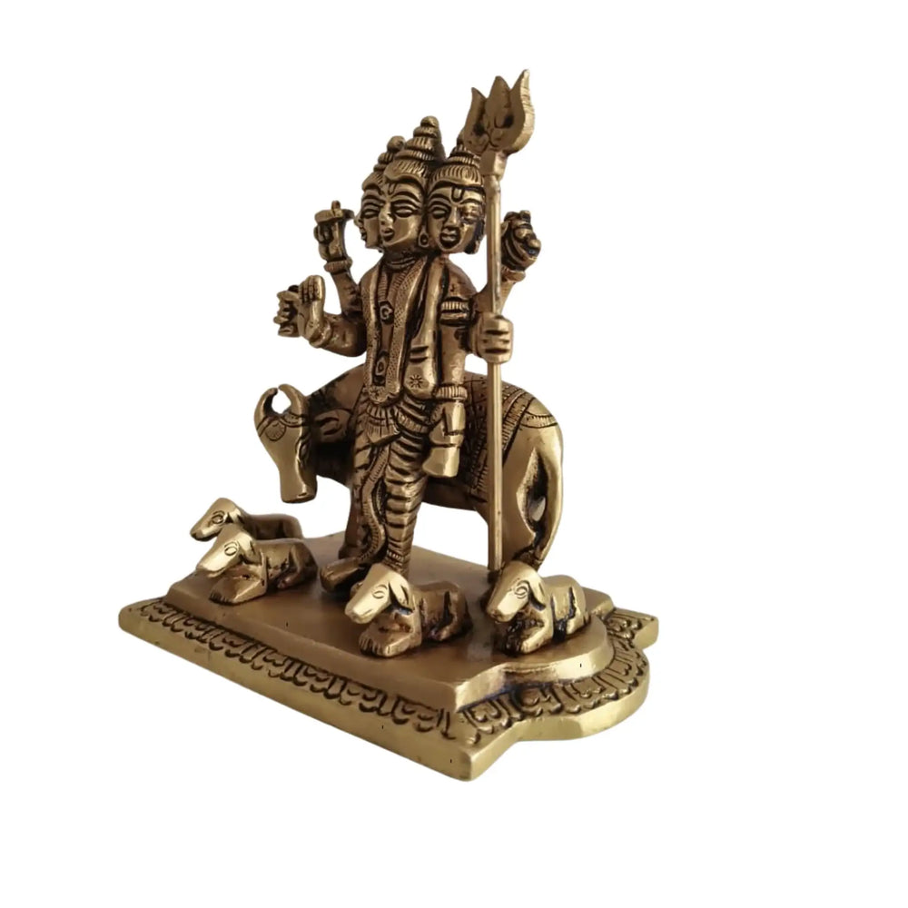 Brass Idol of Dattatreya with Three Heads and Four Dogs   Brass Ware
