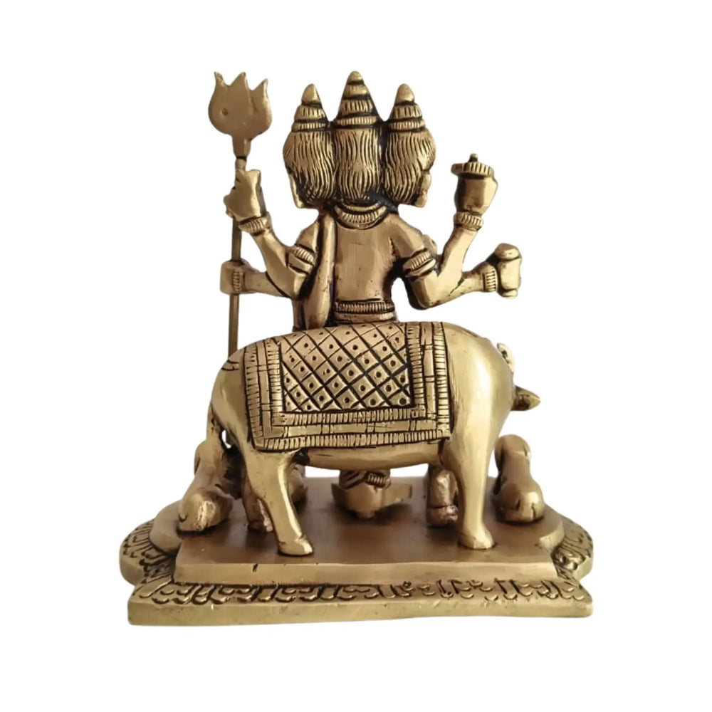 Brass Idol of Dattatreya with Three Heads and Four Dogs   Brass Ware