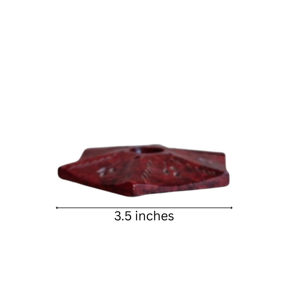 Traditional red soapstone agarbatti stand for pooja room.