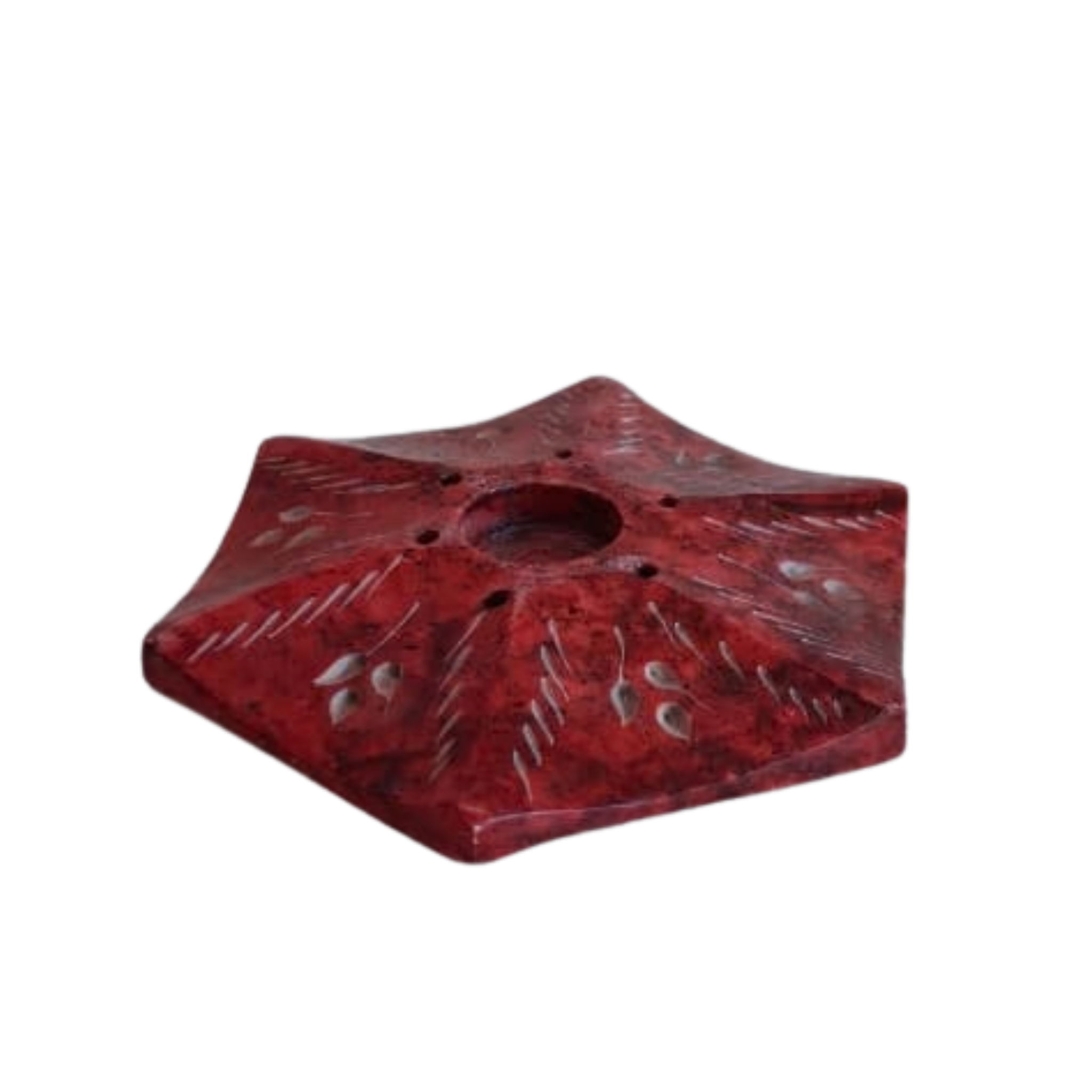 Decorative red stone incense holder with smooth finish.